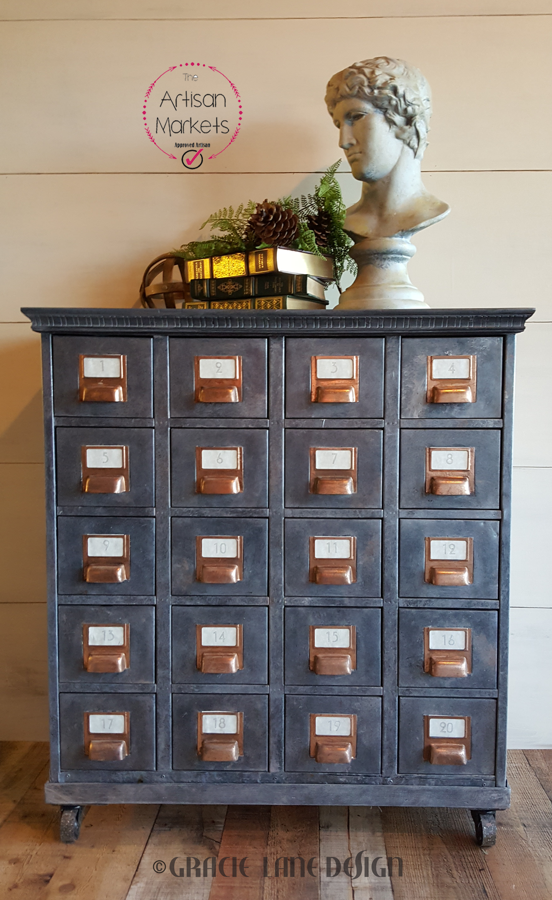 This vintage card catalog gets new life with a zinc finish, copper foil, wooden base and top and industrial casters.