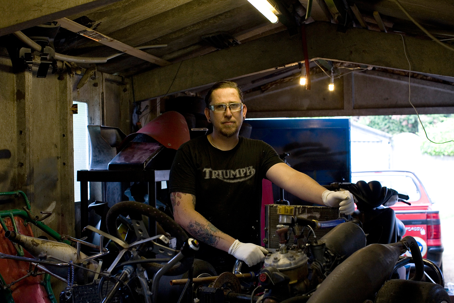  While I spent the afternoon photographing Helen, Basil was working in the garage at the back of the house. I popped outside to see him and took his portrait while Helen made us some tea. I asked him about motorbike parts.  When Helen joined us, she 