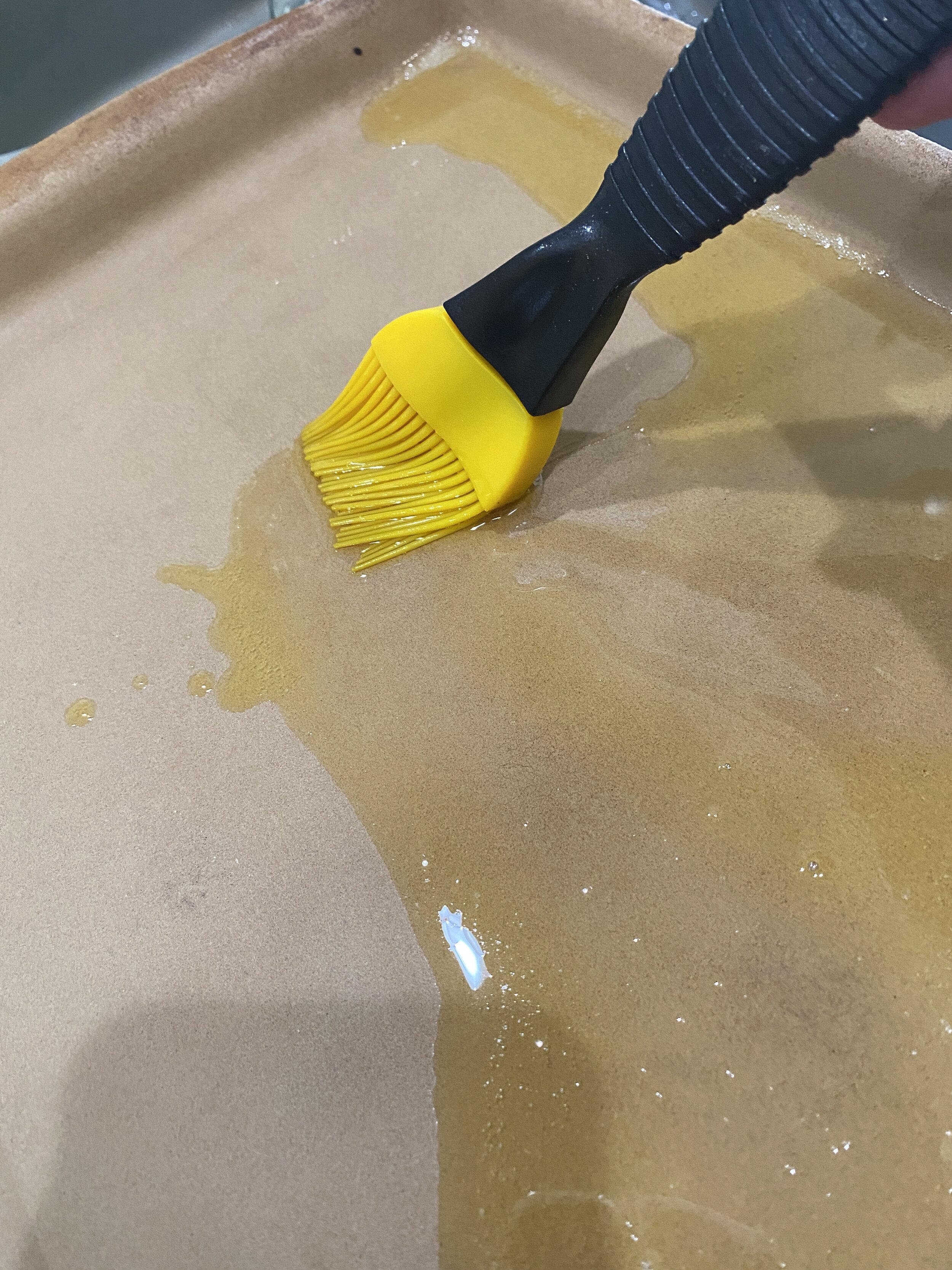 Treating baking dish with clarified butter