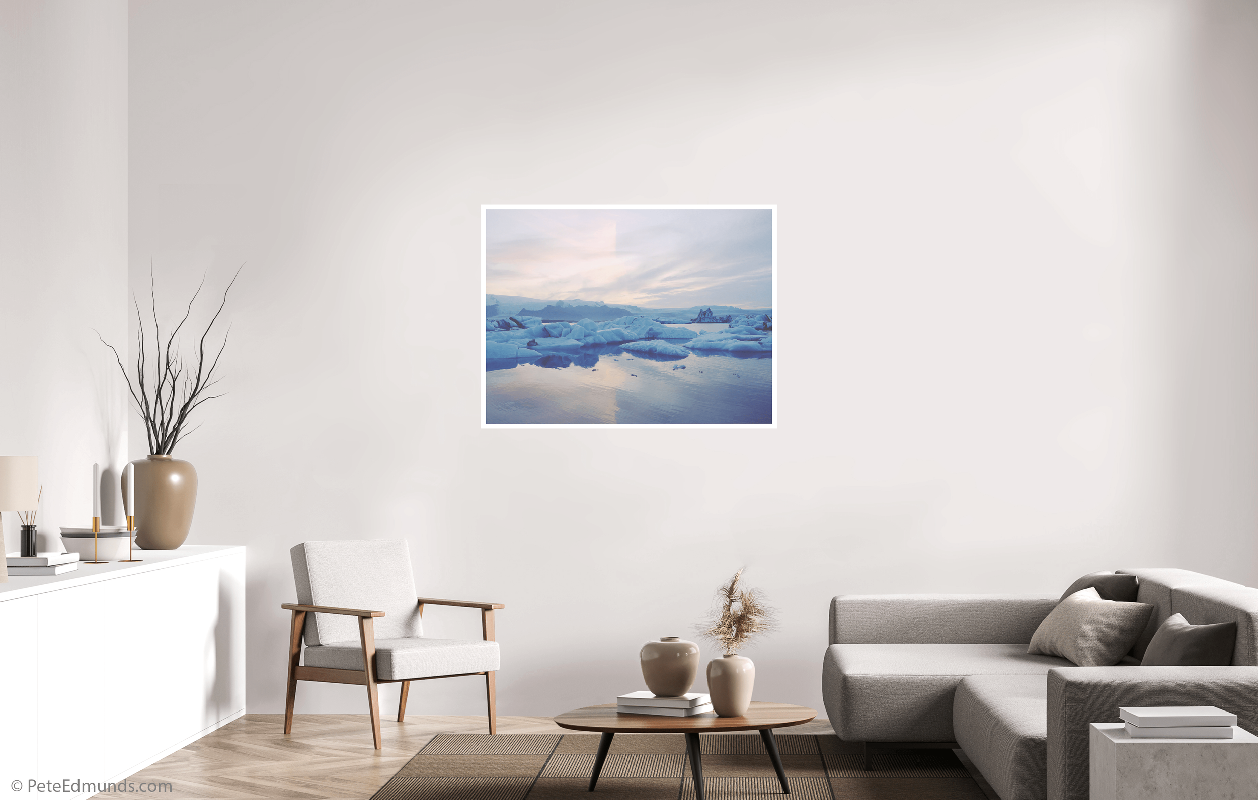 Fine art print Jökulsárlón Glacier Lagoon #1 by Pete Edmunds, 120 × 90 cm with 2 cm white border, displayed in a modern living room with wide wall view and natural light.