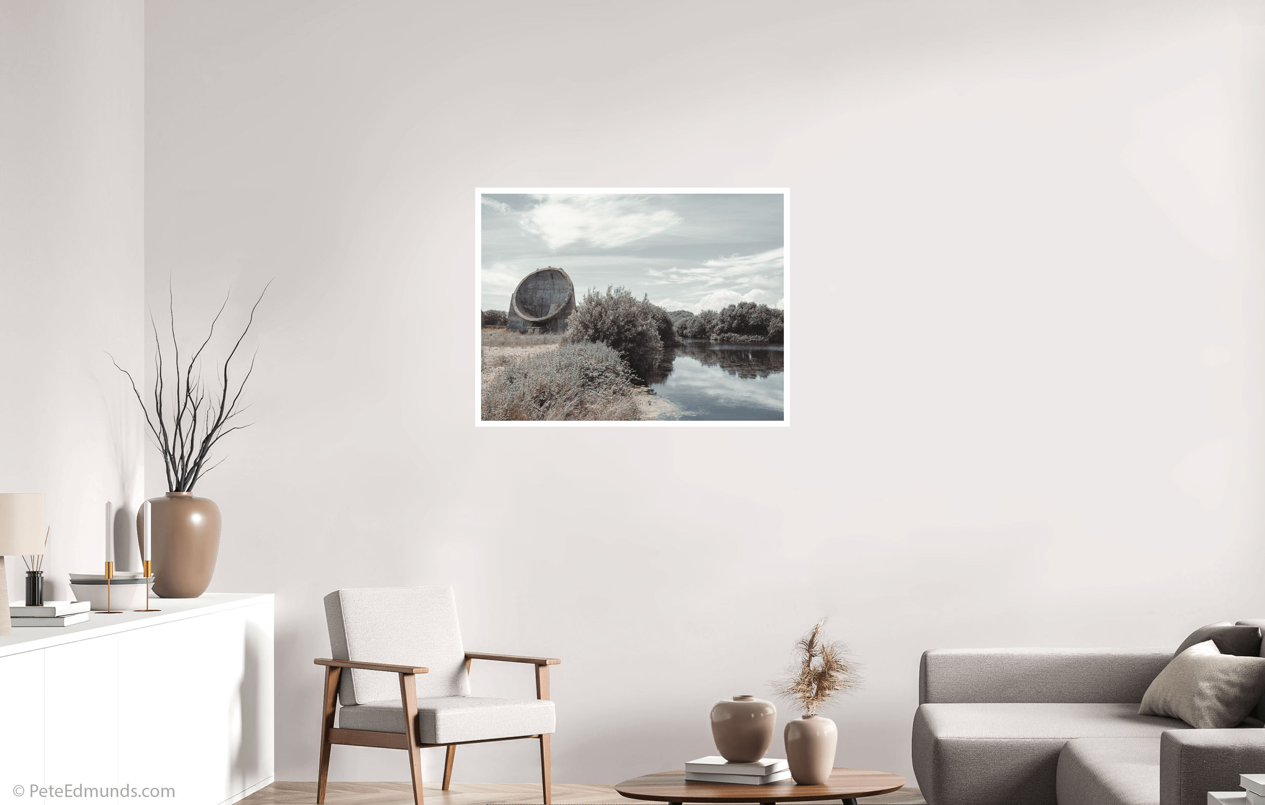 Fine art print Sound Mirror, Greatstone, UK by Pete Edmunds, 100 × 75 cm with 2 cm white border, displayed in a modern living room with wide wall view and natural light.