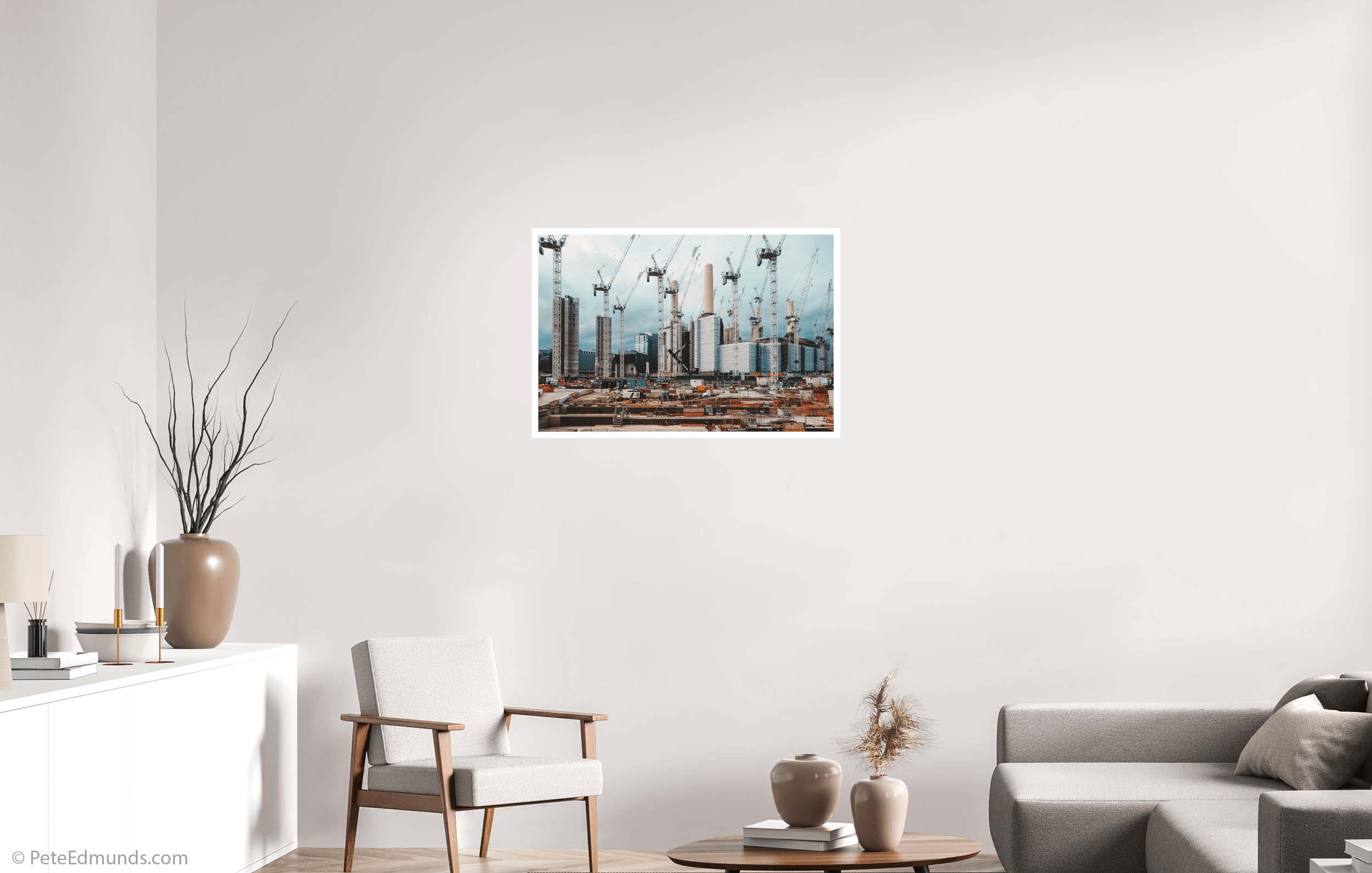 Fine art print Battersea Power Station Construction 2019 by Pete Edmunds, 90 × 60 cm with 2 cm white border, displayed in a minimalist living room with neutral decor and soft natural light.