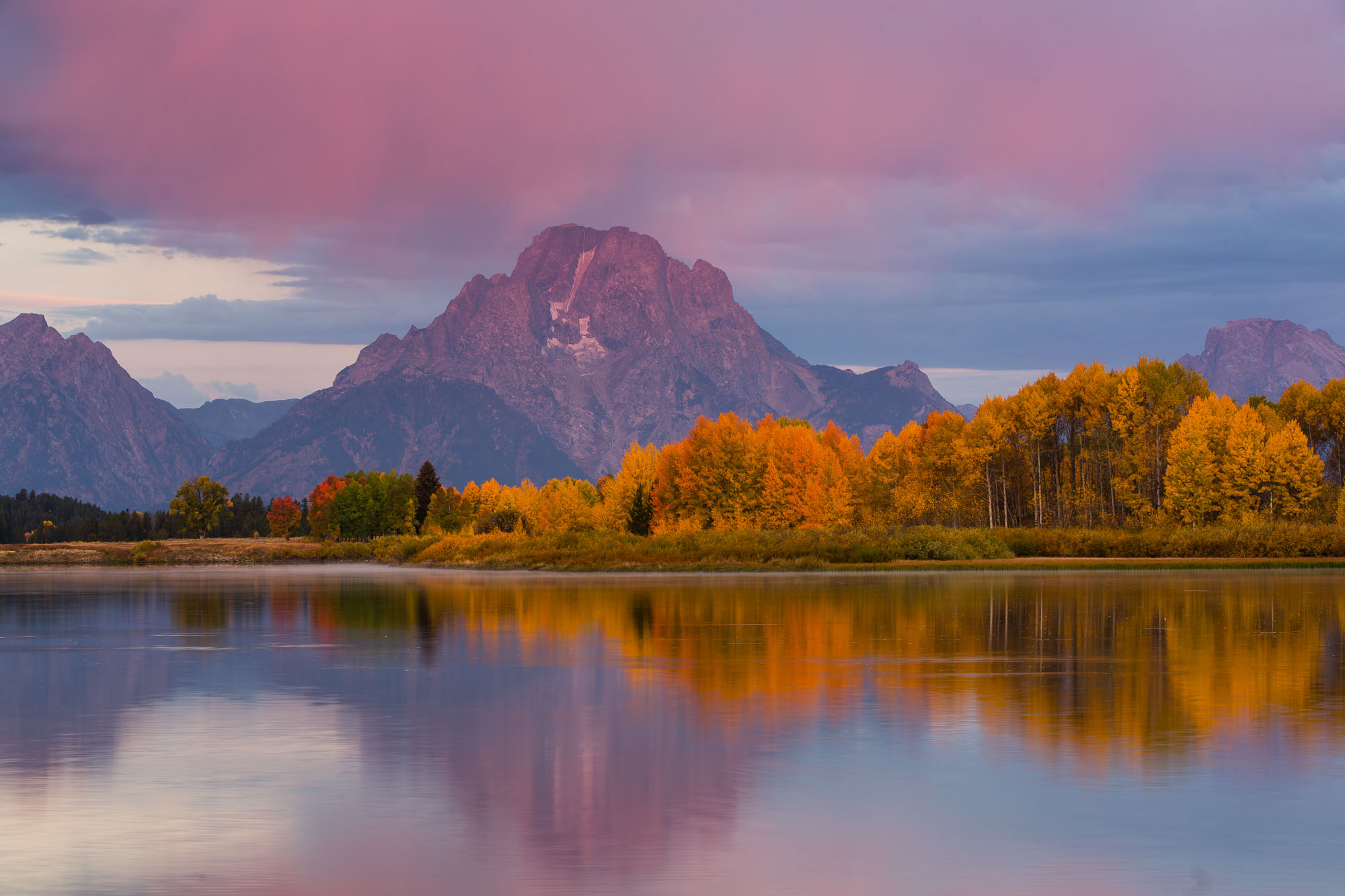 Dawn breaks over Oxbow Bend in Autumn