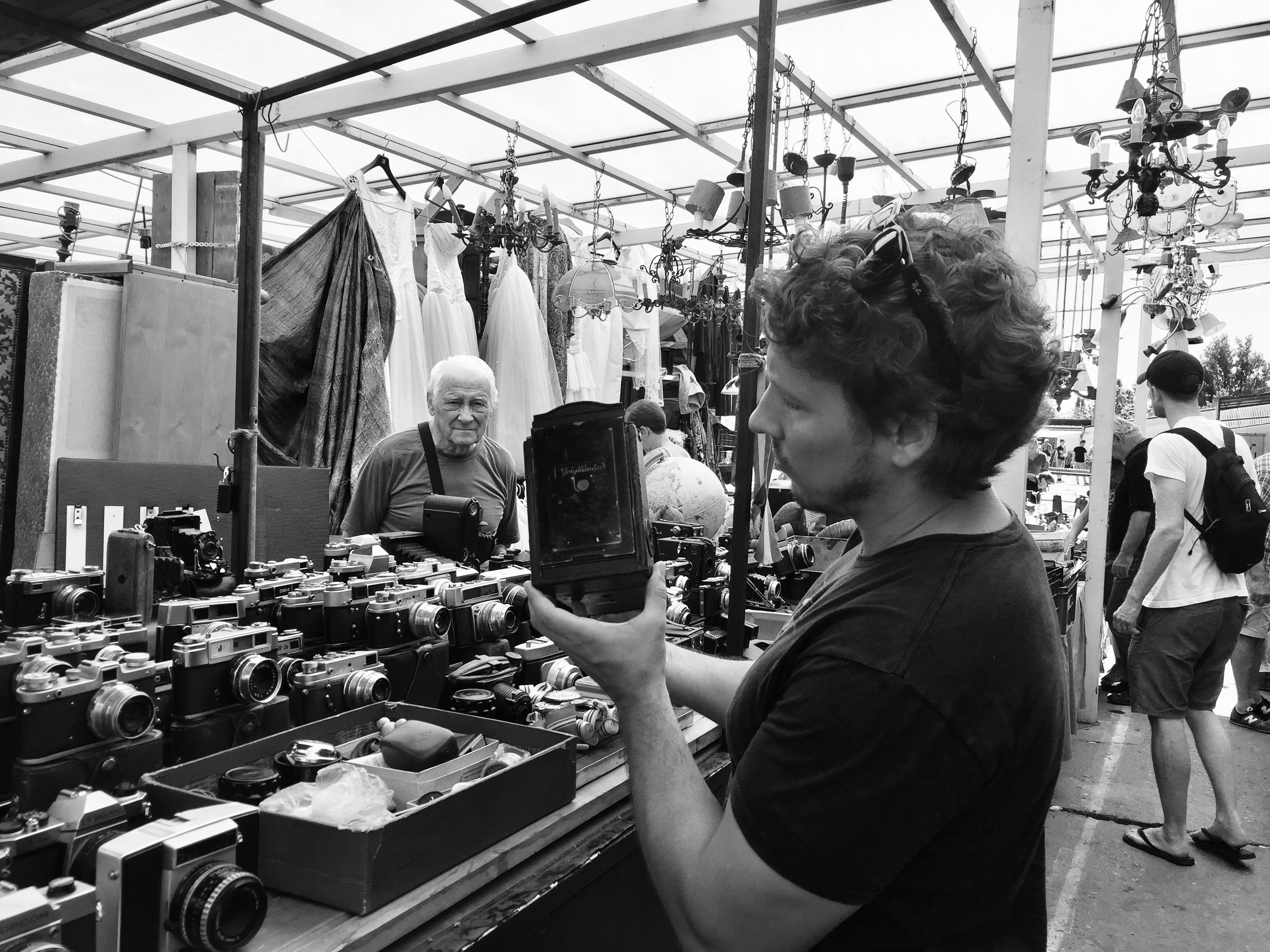 Just a mute guy inspecting an old camera