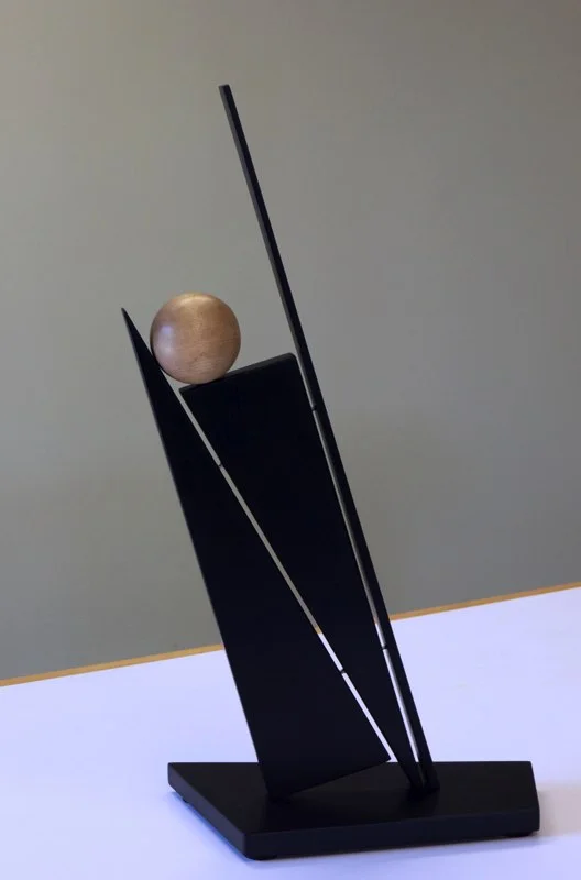 Balancing Act , 2012 paperstone, maple 21" x 12" x 6"