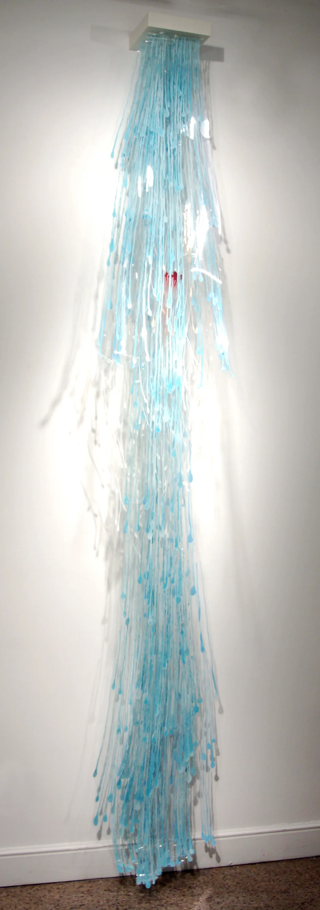 Katy Stone Angels Fall , 2005 acrylic on Dura-Lar, cast shadows 120" x 16" x 9"