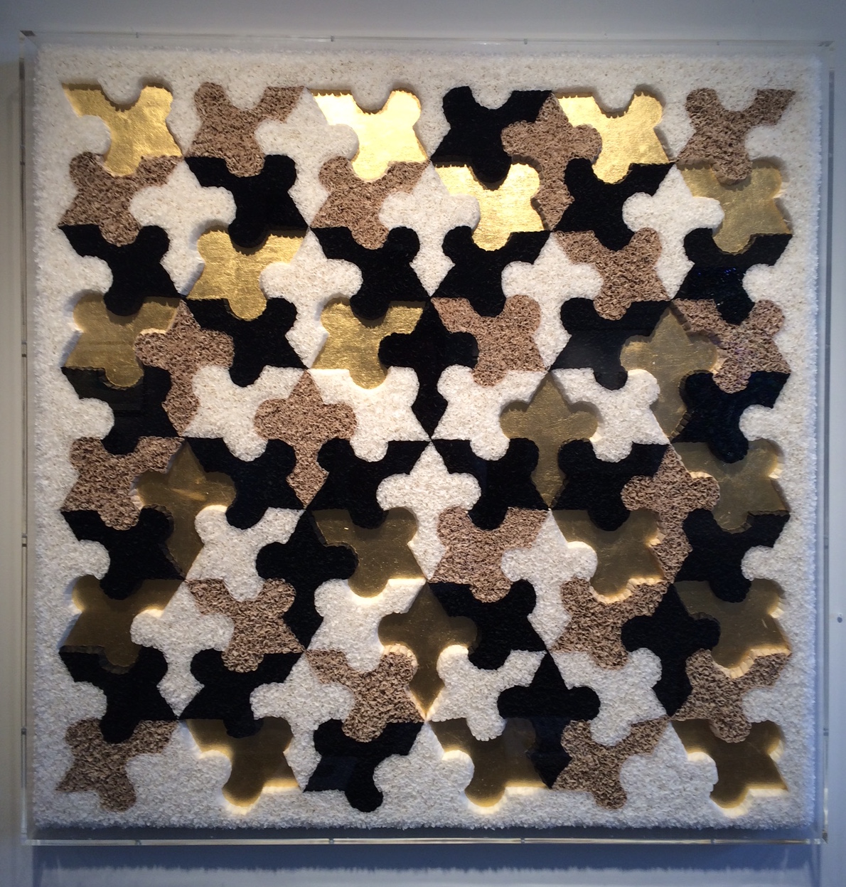 Lore Bert (BIO) "30 Lillies," 2012 relief object with Japanese paper, Nepalese paper, and gold leaf 48" x 48"