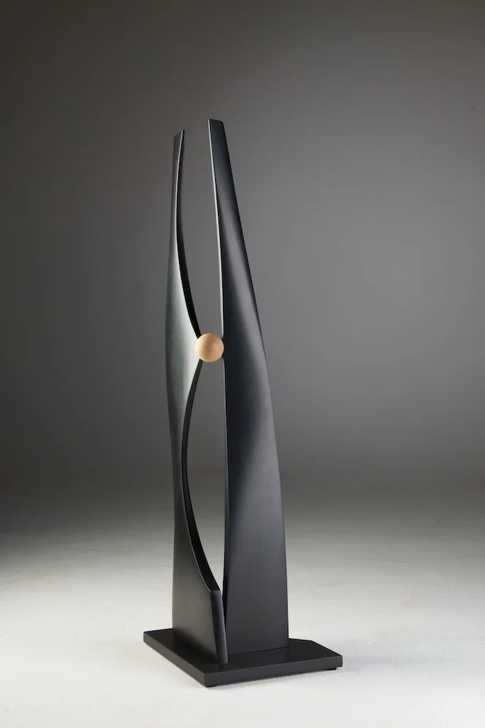 John Schwartzkopf, “Geometric Tango,” 2012, paperstone, maple, 37” x 12” x 10”