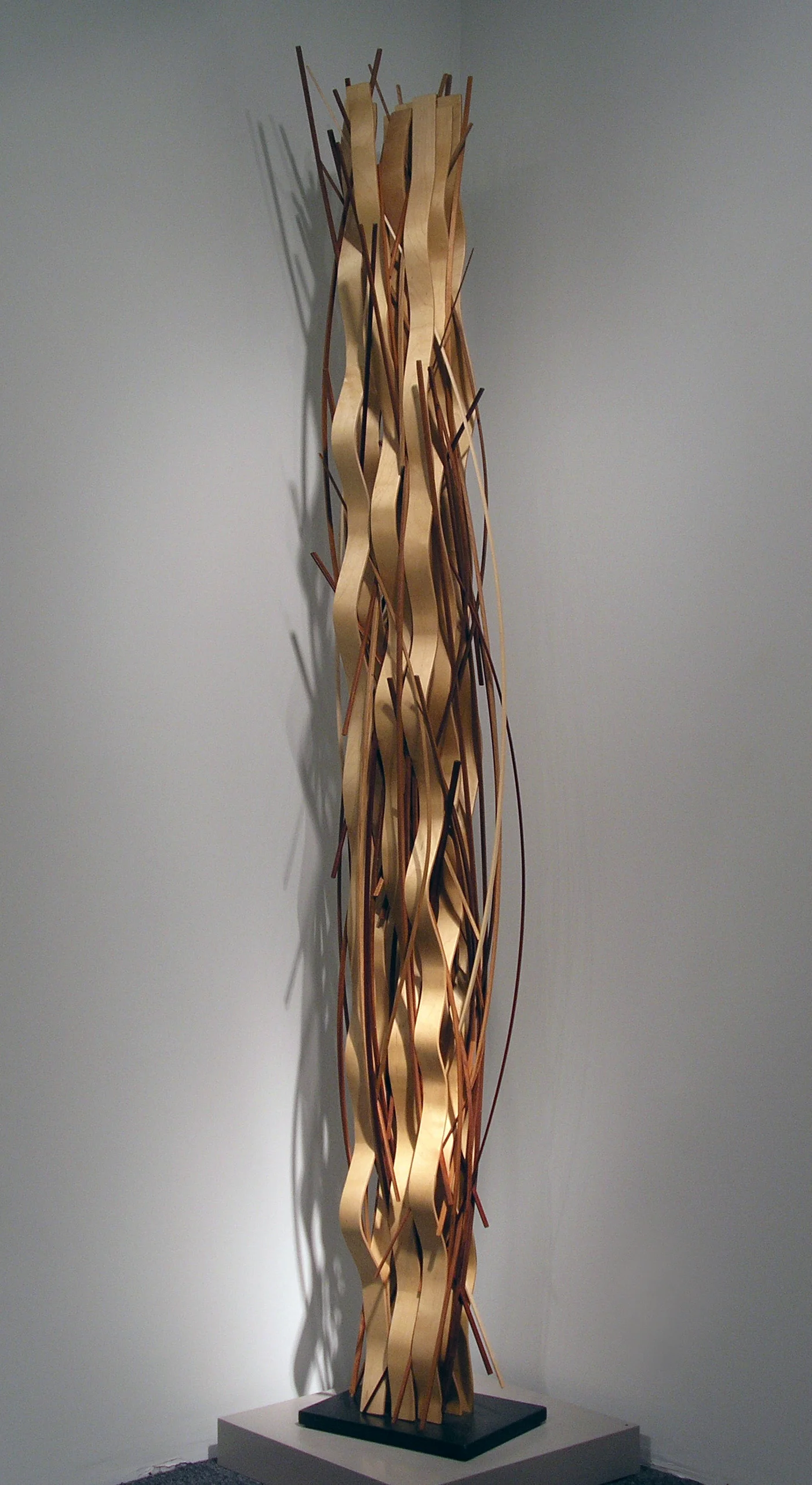 John Schwartzkopf, “Ribbon Waveform II,” 2005 , environ base, birch, and various woods, 95 3/4” x 15” x 11”