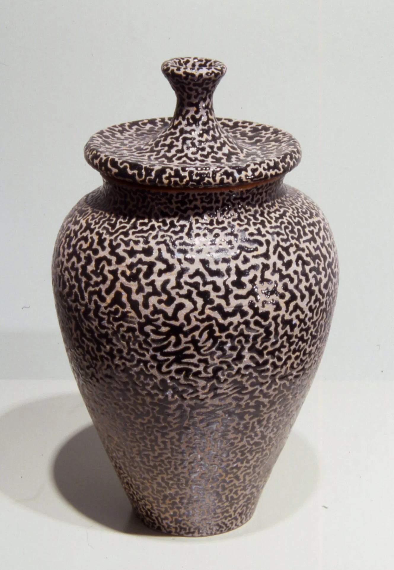 William Yonker, “Lidded Jar,” 2003, terra cotta with low fire glaze, 12” x 6 1/4” x 6 1/4”, $700