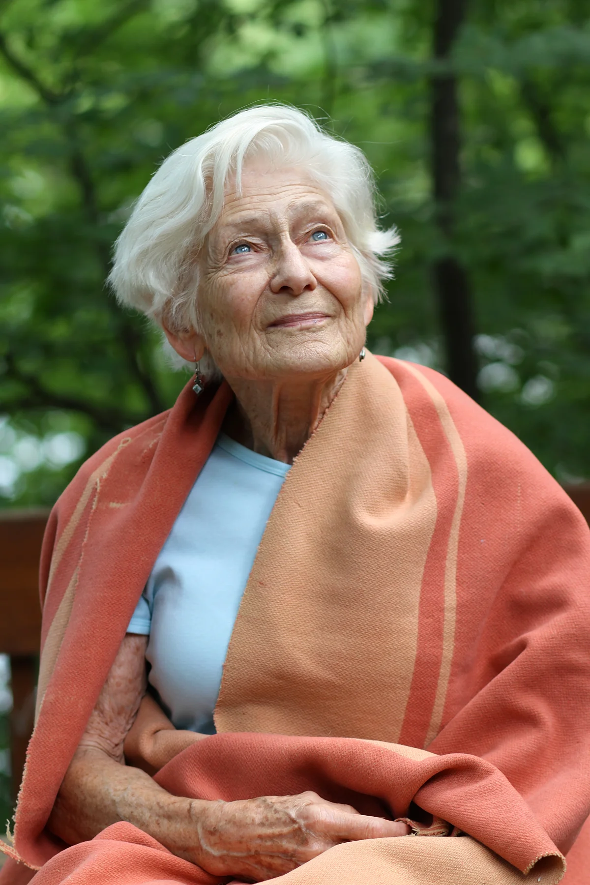 Irene in 2013 with her childhood blanket, the same one she had through Westerbork, Bergen-Belsen, and Camp Jeanne d'Arc in Algeria.