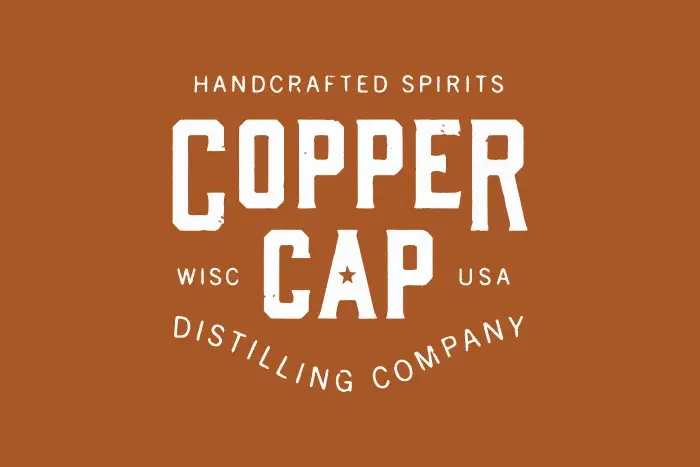 Logo for Copper Cap Distilling Company.