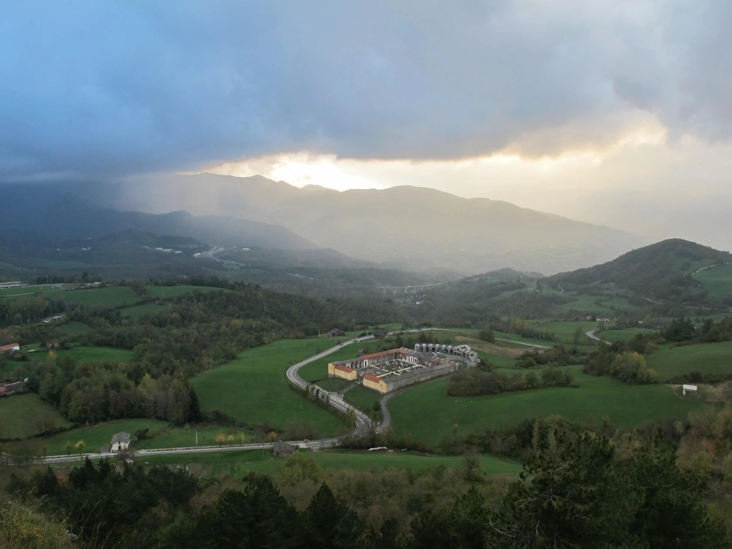 Looking down at the cemetery on the way into Berceto (Italy) on the Via Francigena