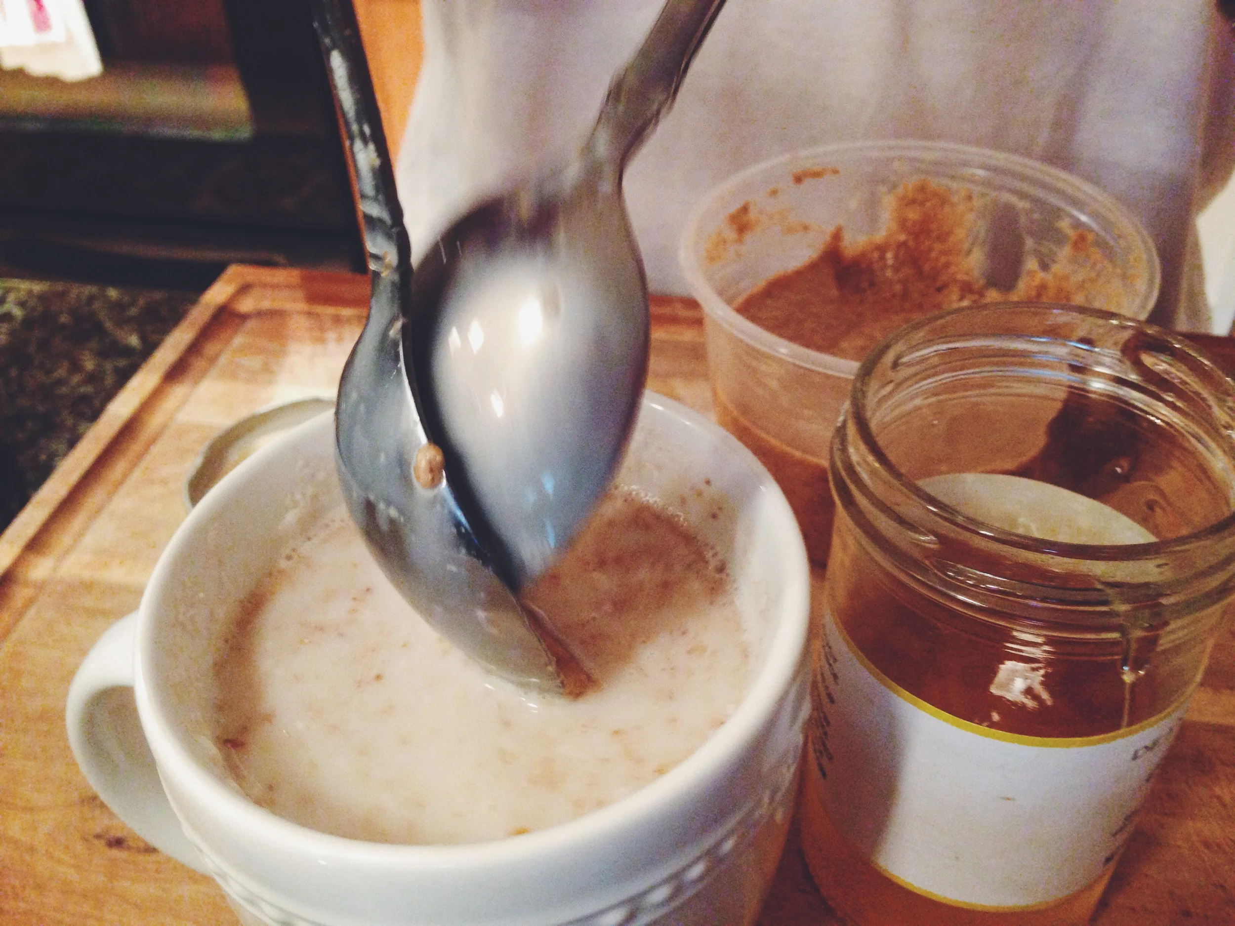 Might want to use two spoons to get all the butter and honey off. Give your drink a good stir and enjoy!