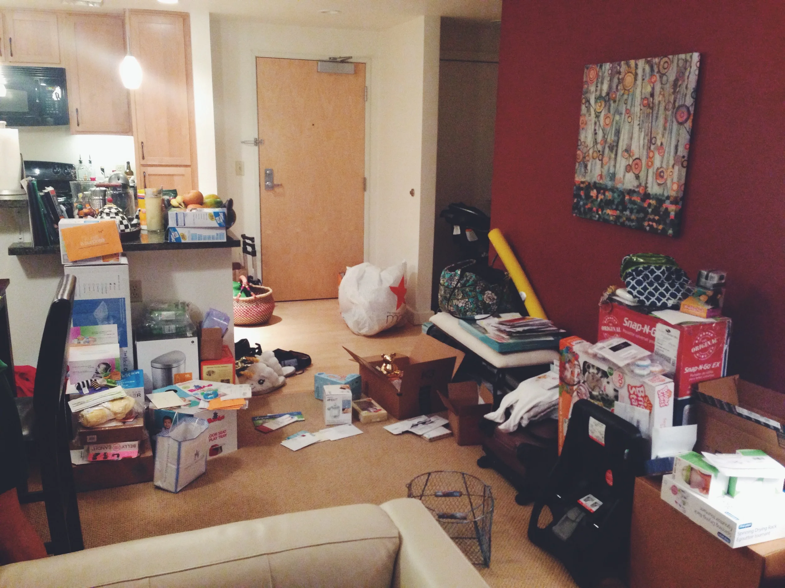 This is NOT what my place usually looks like but we had to sort all of the baby gifts. I promise it looks much cleaner now. 