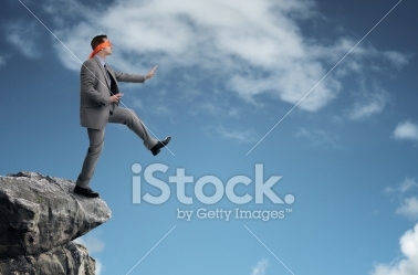 stock-photo-30486930-stepping-off-a-cliff-ledge.jpg