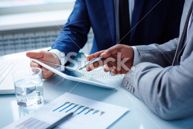 stock-photo-36850398-pointing-at-touchpad.jpg