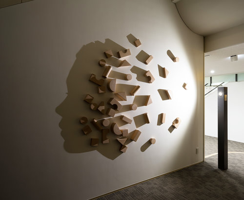 BUILDING BLOCKS    2014 H200, W300, D10 cm Carved wood, single light source, shadow Permanent Collection Otsuma Women's University, Tokyo, Japan