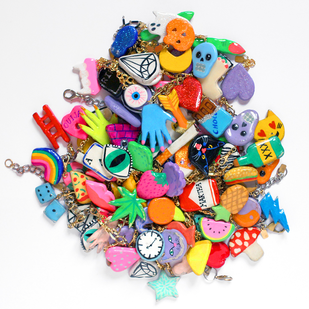 All of my charm necklaces in a heap. I am rarely without them, and I change the necklace I wear seasonally.