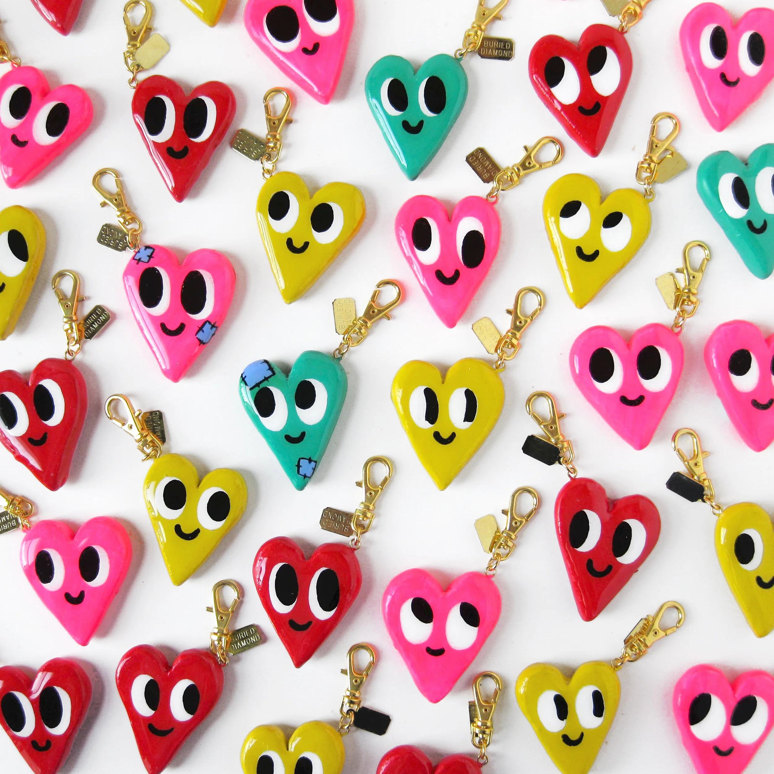 Each charm has a unique face - and they are double sided! So you get 2 faces on each charm. A few special charms have little patches on them, those are my personal favorites.