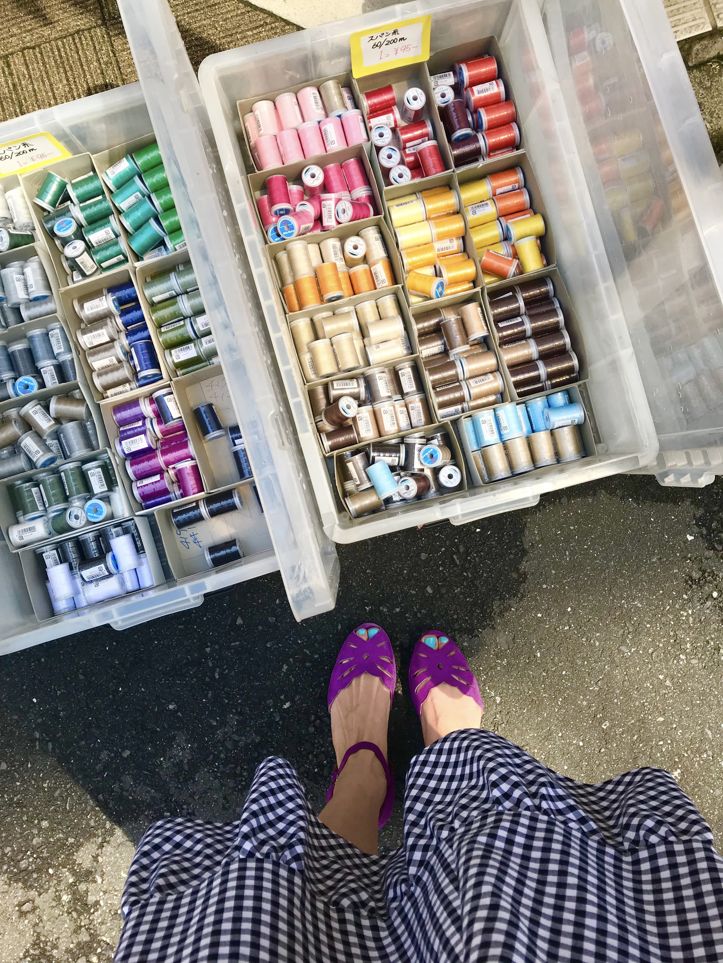  Bins of thread on the sidewalk in Nippori Textile Town. 