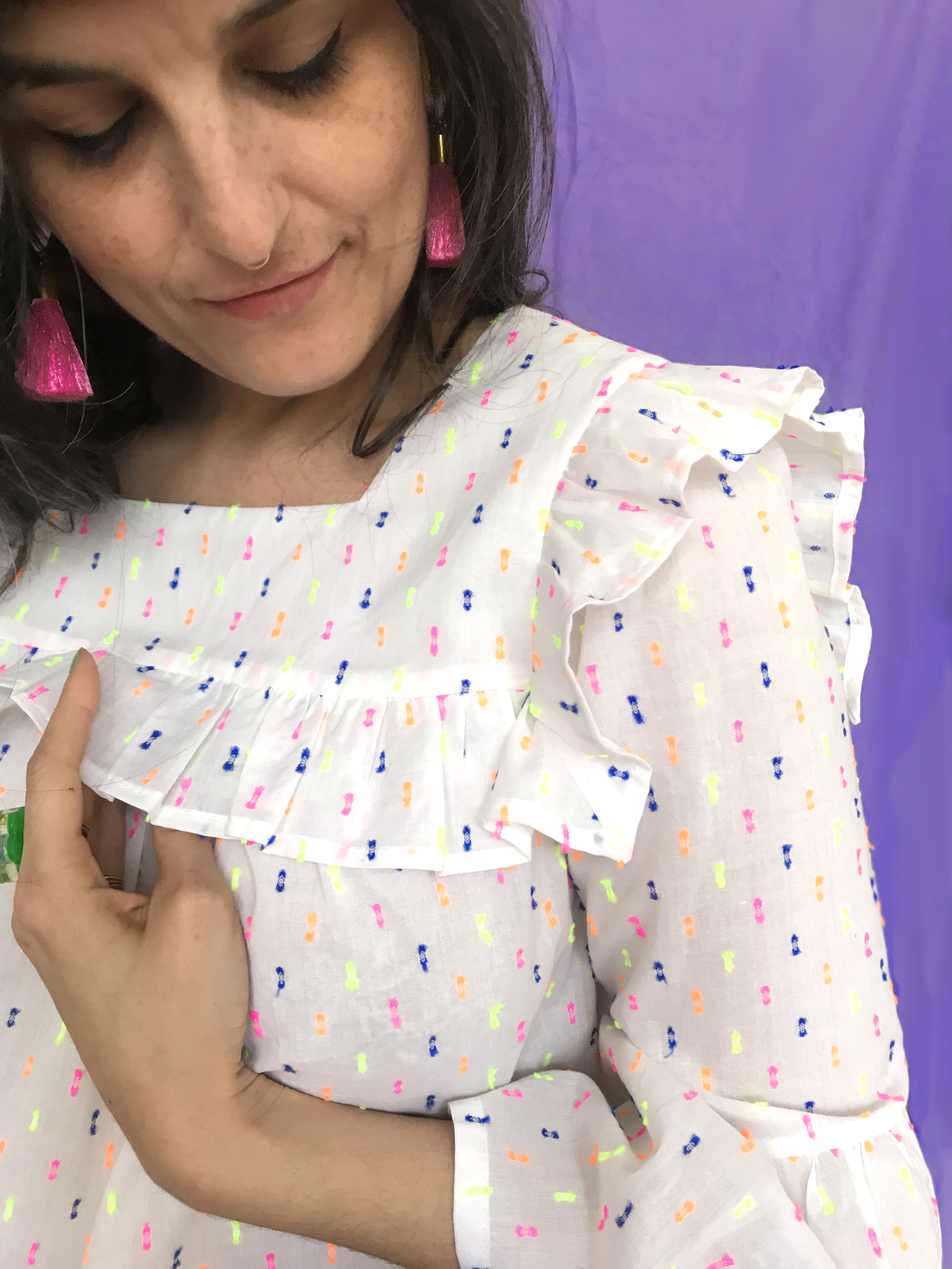  The ruffles are sandwiched between the yoke and yoke lining. This pattern has lots of markings to help you get crisp points to the yoke corners. 