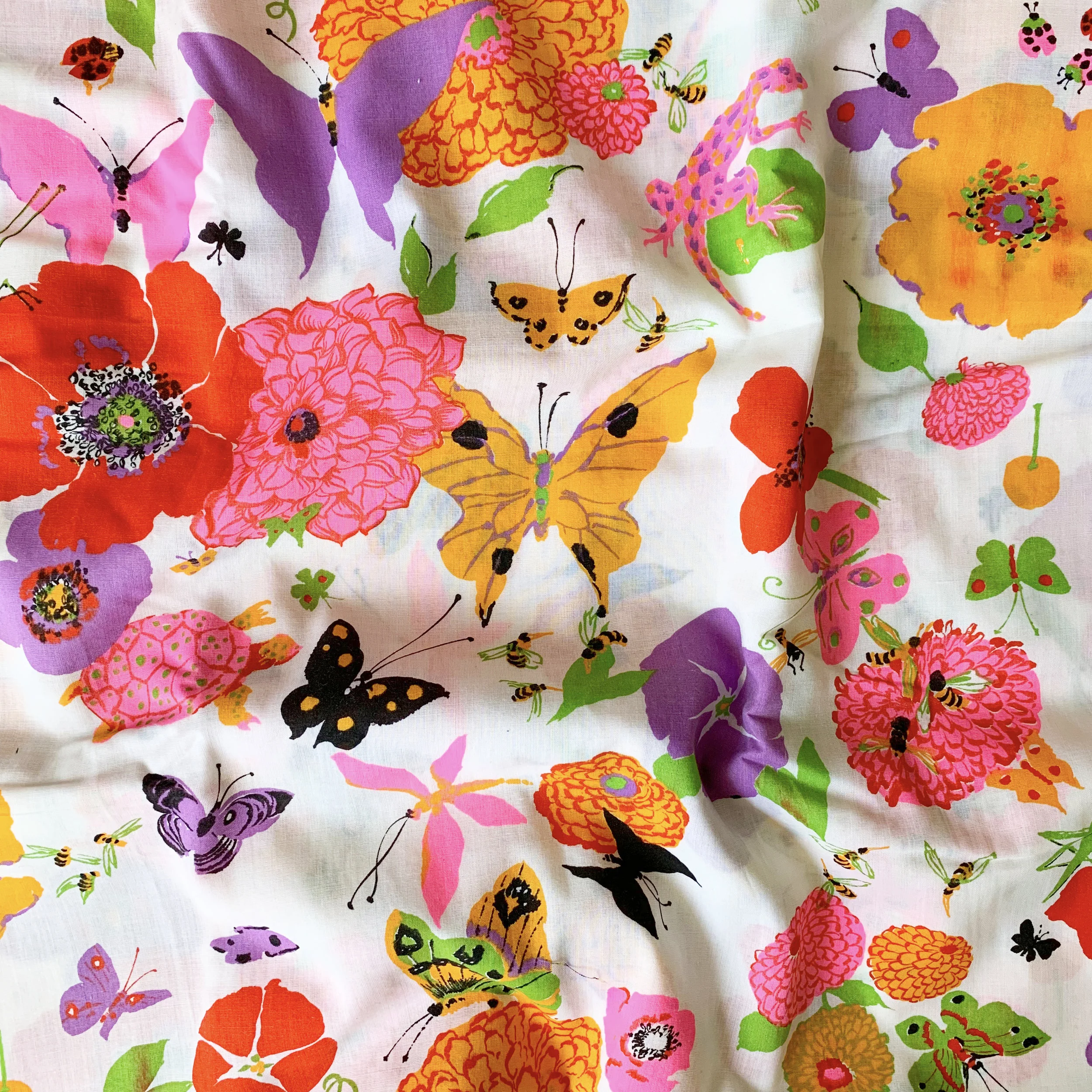 One of my all time favorite pieces in my stash, which I affectionately refer to as my Future Dream Wardrobe: a rayon cotton blend voile with neon pigment prints of magical flora and fauna.