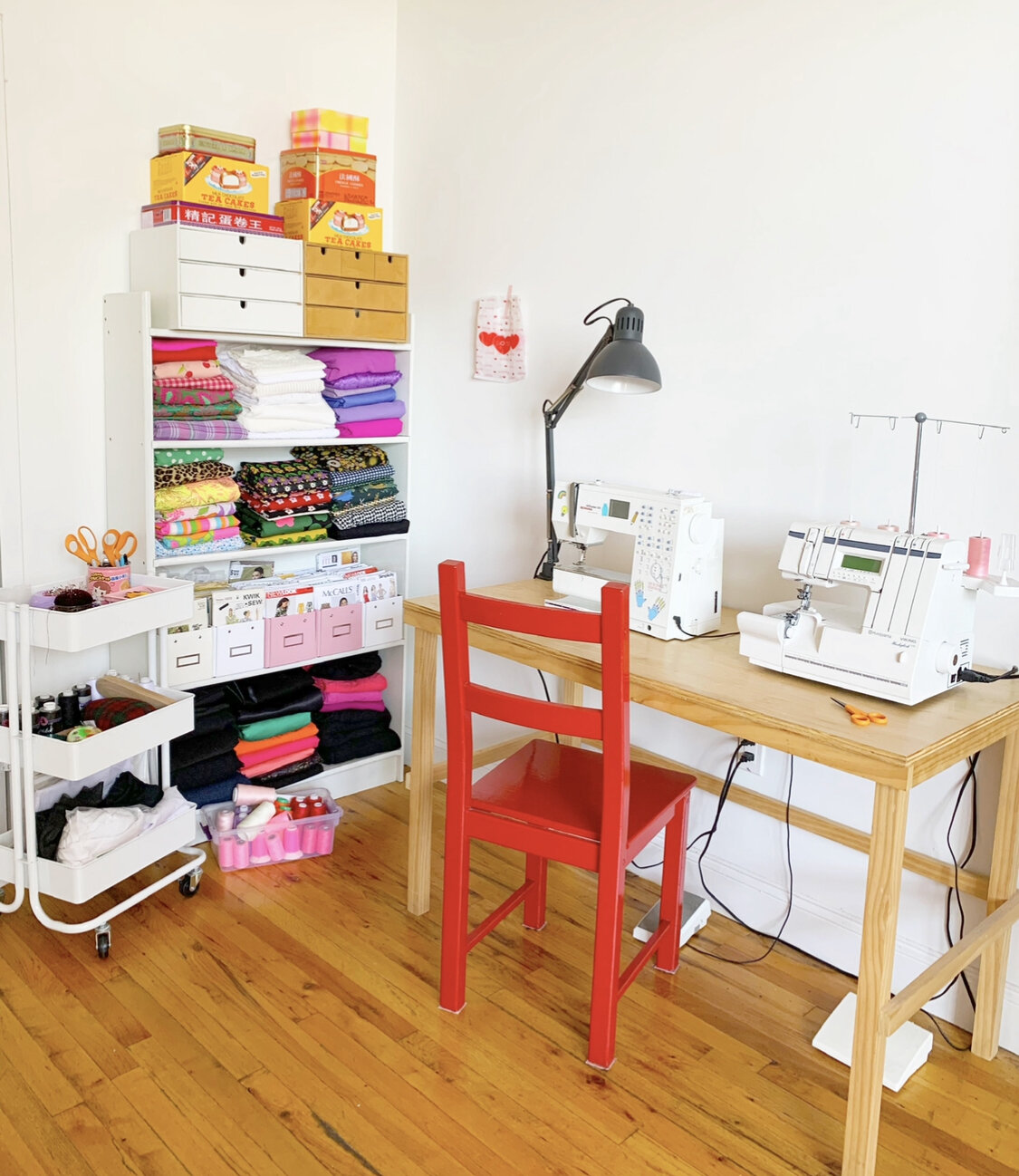  My sewing space! I set up the ironing board wherever there was room. 