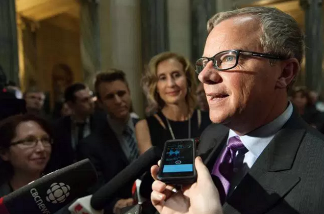 Source : The Canadian Press/Michael Bell. Saskatchewan Premier Brad Wall released a climate change plan on Oct. 18 that he is calling an alternative approach to the recently announced carbon price.