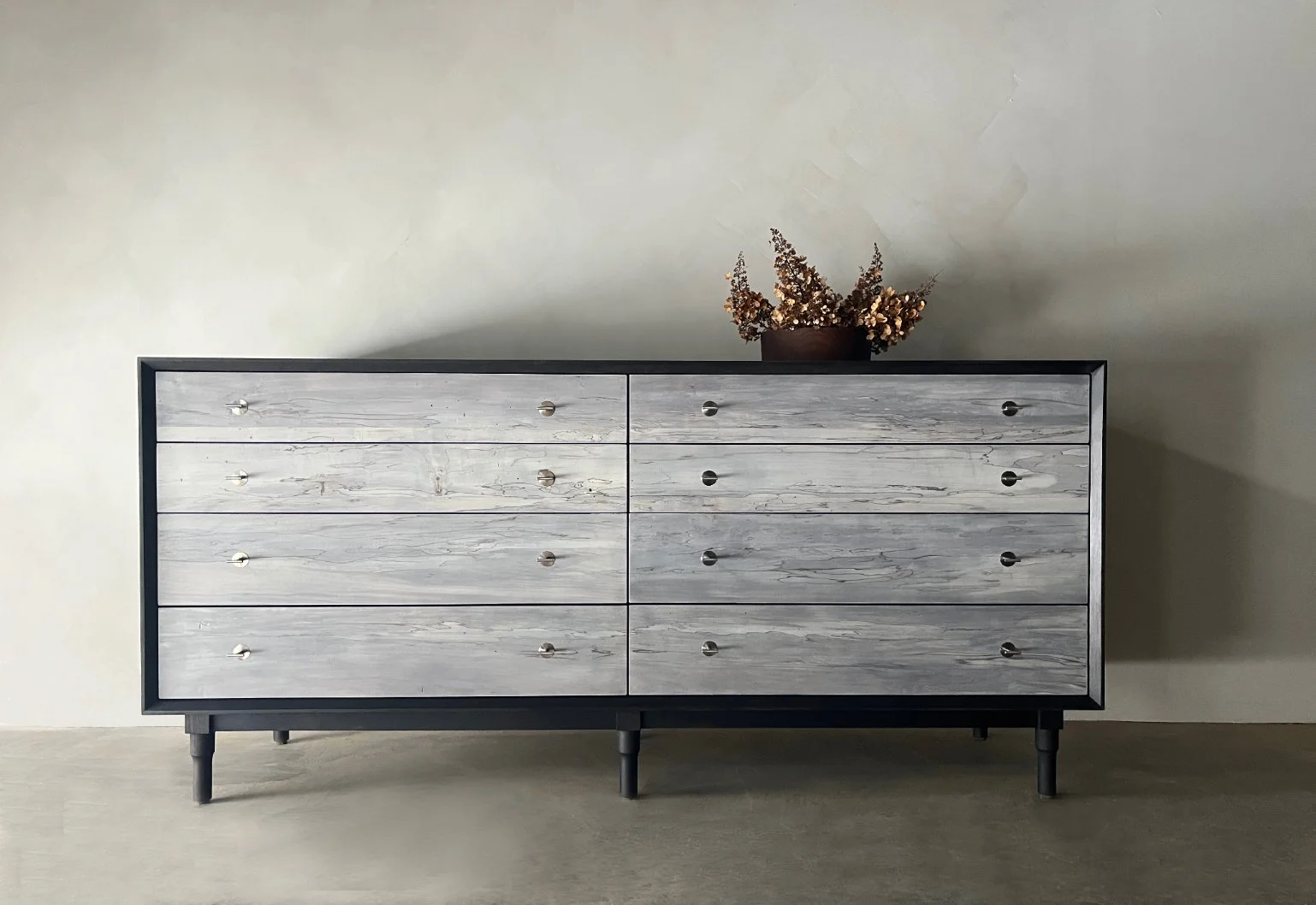 oxidized walnut dresser with spalted drawer fronts and nickel hardware