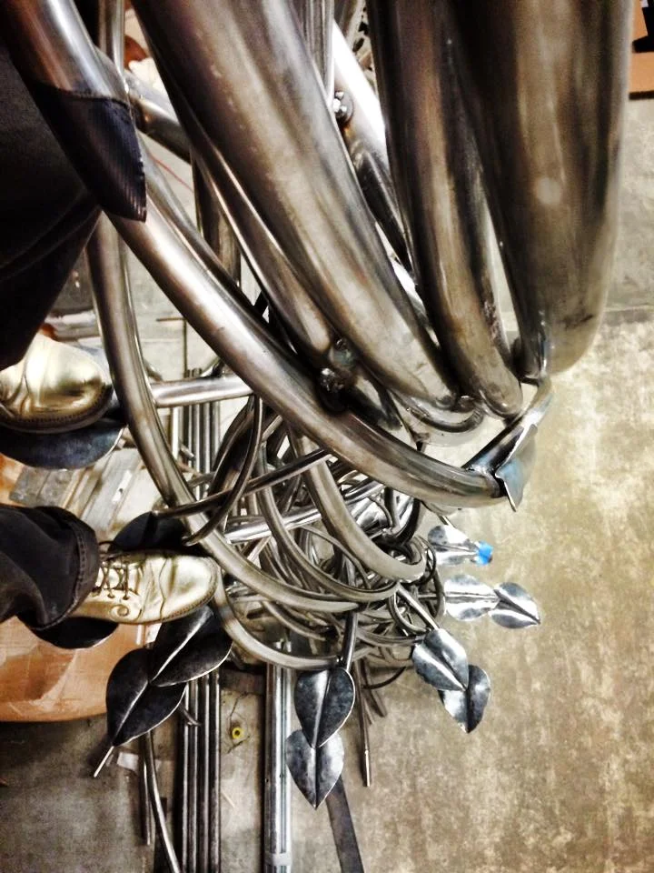 I bent some of these metal poles to create the bean stalk ladder.
