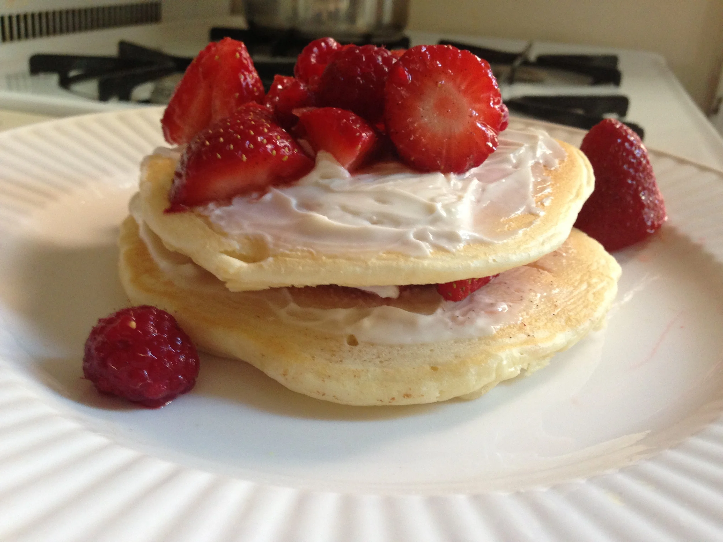 Almond Pancakes with Sweetened Cream Cheese and Red Berries