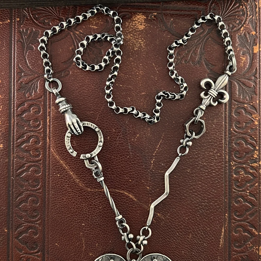 Three of Swords Dragonscale Heart Necklace with Garnet — Rewind