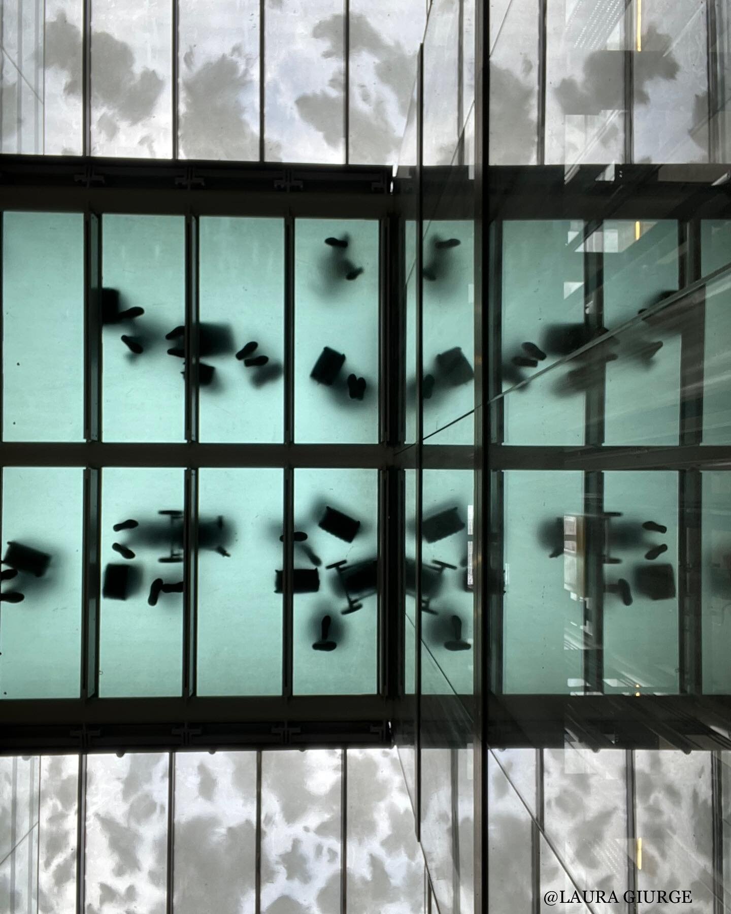 What if we would look up more often than we look down. As seen in Paddington station. nN edits, just people, clouds, and natural symmetry. 

This view reminded me of **this is water** by David Foster Wallace.

Life happens now, in this second, in thi