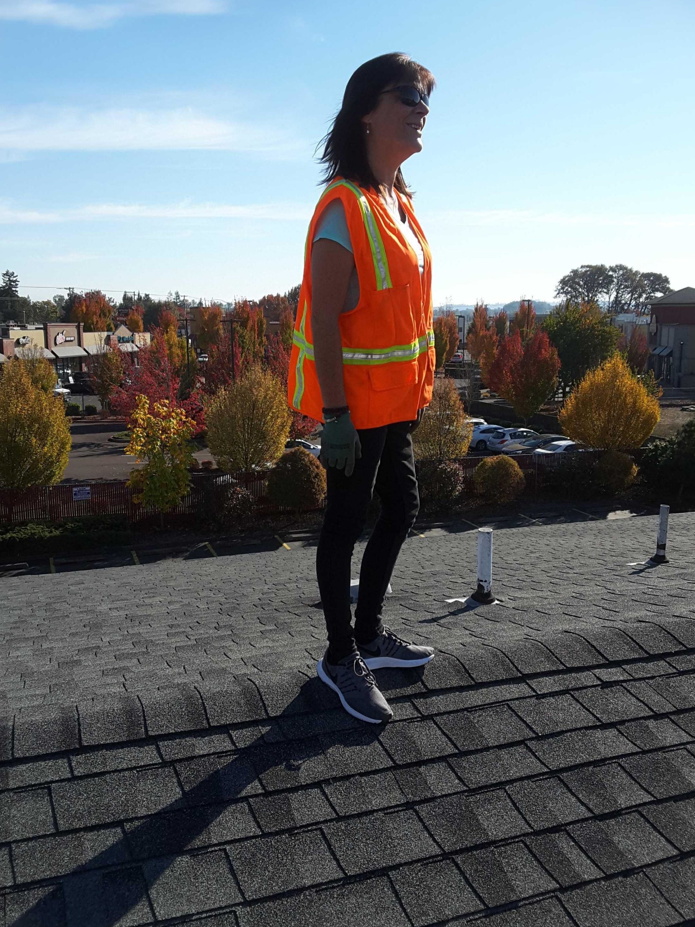 Wife inspector on commercial roof