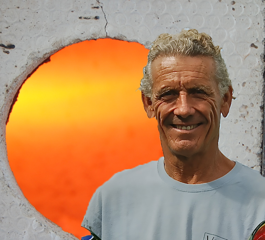 in front of the "glory Hole" that allows the reheating of the glass in daily studio operations.