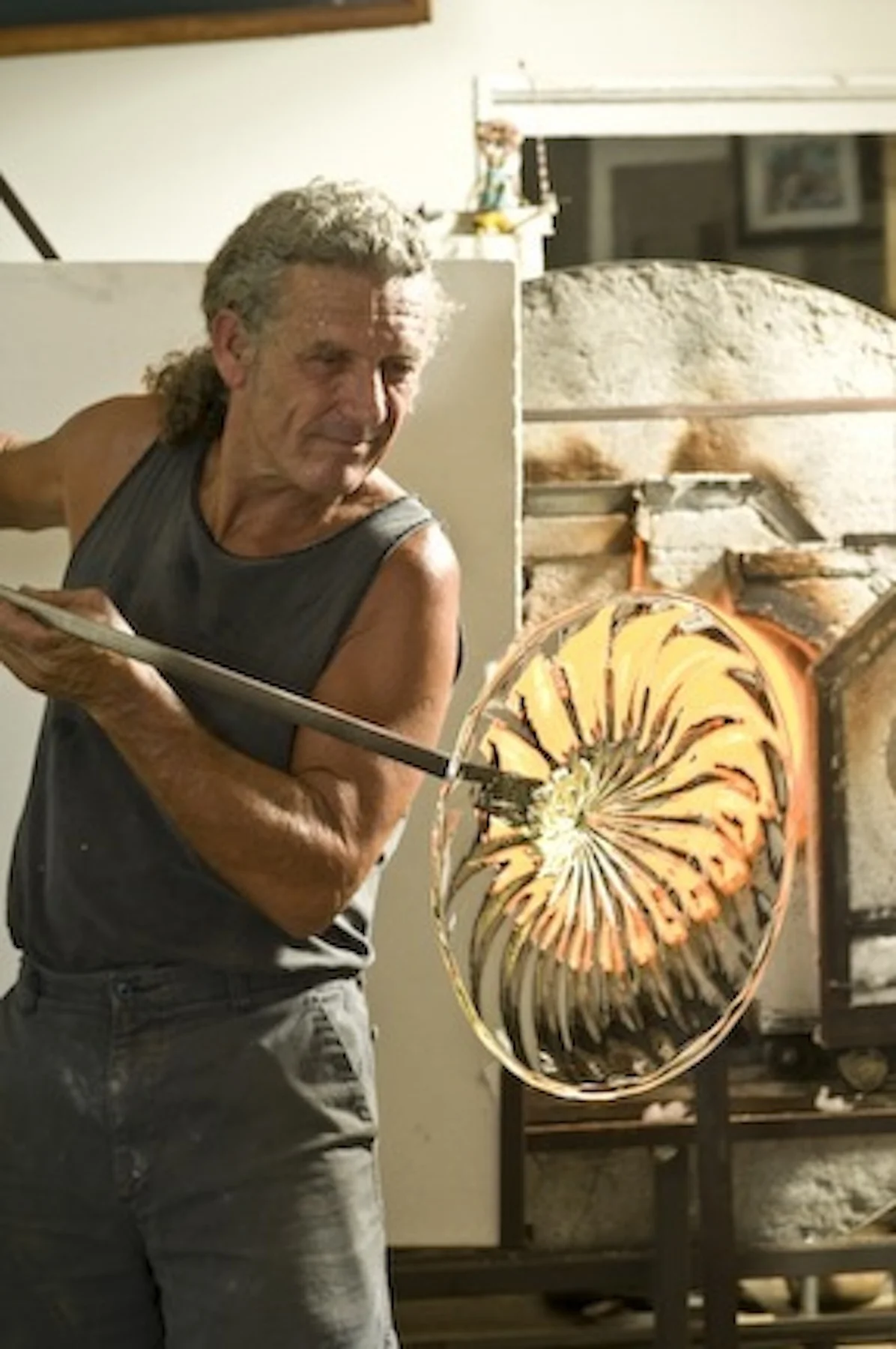 Rick spinning a rondel for some wall art.
