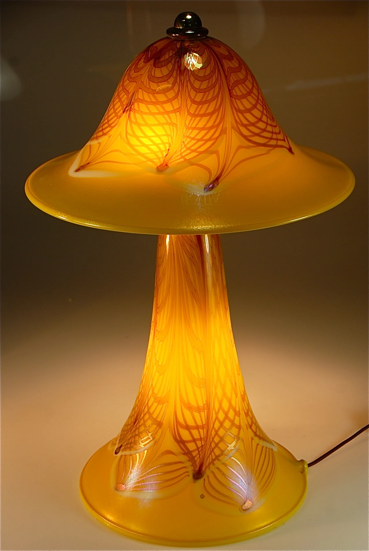 recently finished LEmon Opal with Lace decoration, this two piece lamp has the base and the top illuminated. There is a dimmer switch in line on cord. This lamp is for sale, inquire.. rick strini 808 572-6283 