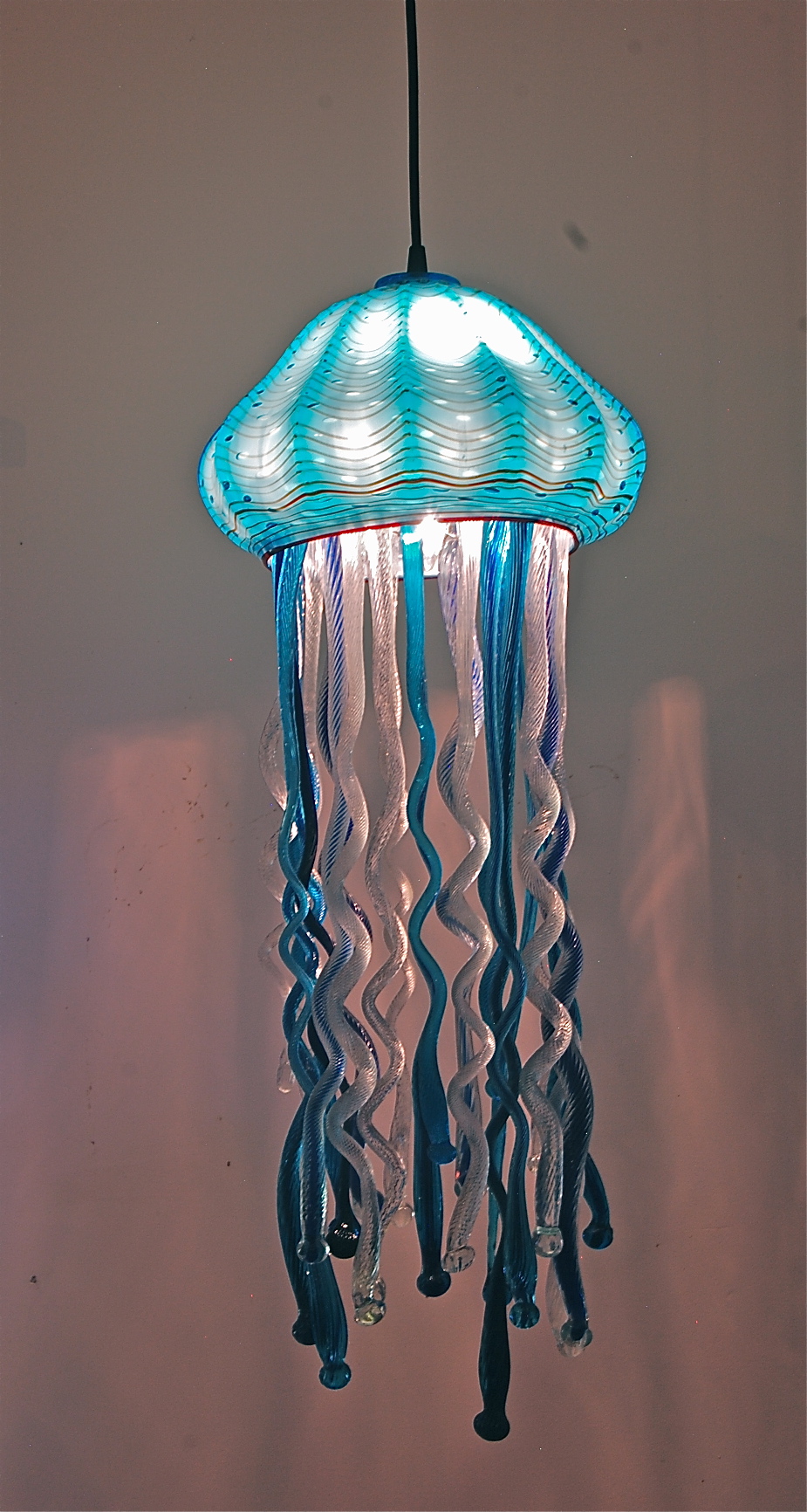 Turquoise with bubbles and ruby lip wrap. nickel finish canopy