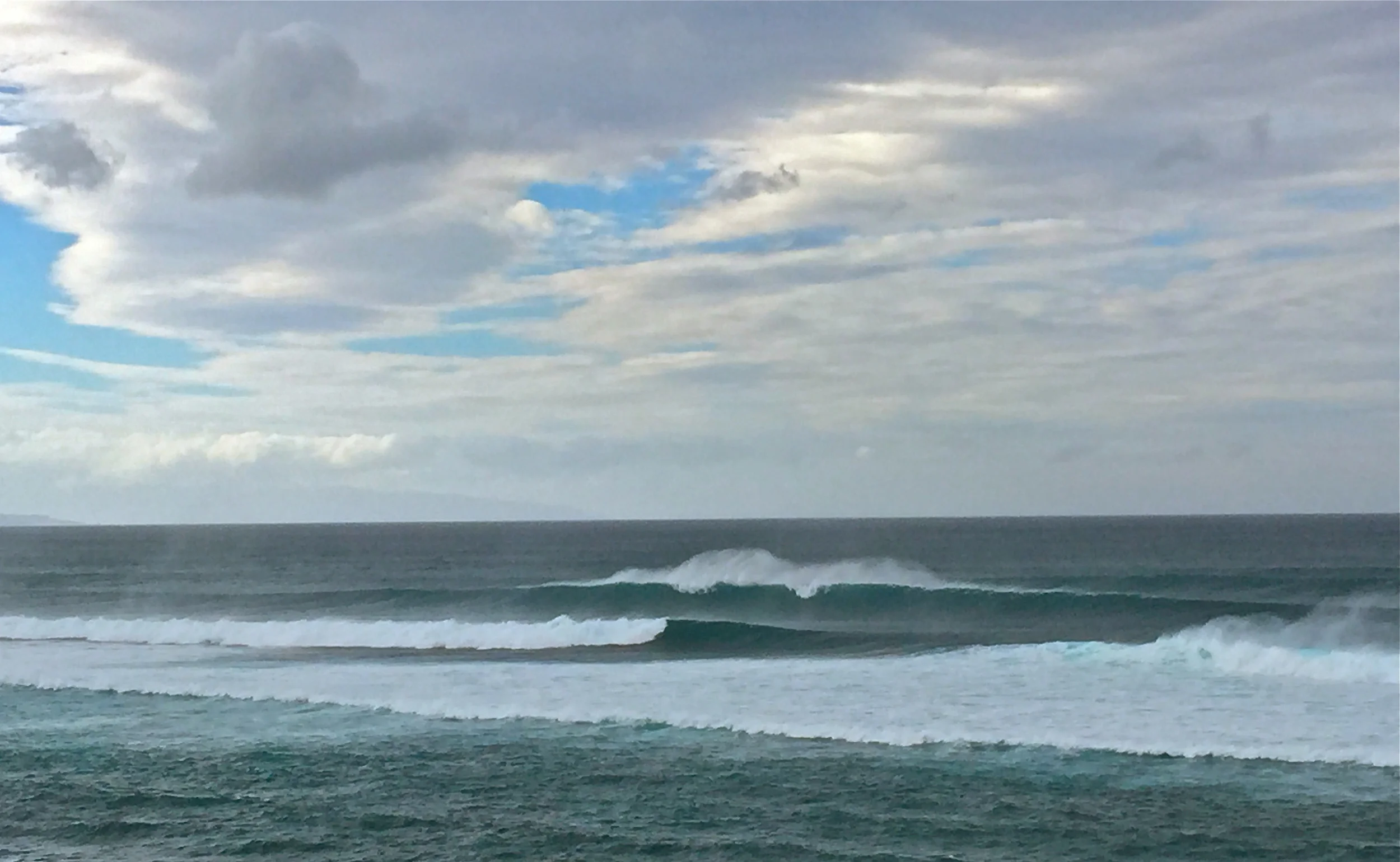 Kona winds, straight offshore, too bad for kiting. perfect waves and in the 20' range. hard to tell how big they are as they are so perfect . later a couple of young guns went out and ripped it apart on windsurfers. 5 in the afternoon. yesterday