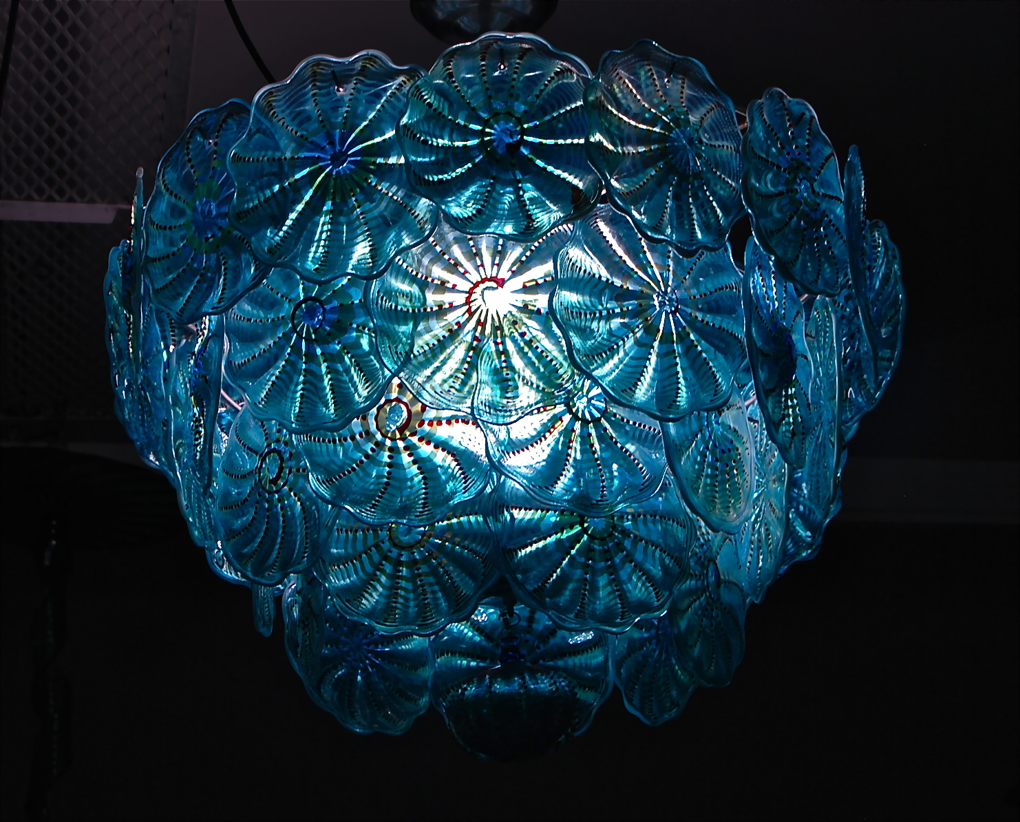 Rondel Chandelier, 46 pieces hand blown rondels, Turquoise cathedral, decorated silver luster, ruby glass pearls, white opal lip and applied iridescence.