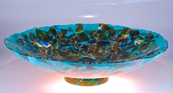 27" diameter x 7" high fused glass using a new blowing technique called Sfumado, Italian for blending of colors, recycled blown glass fused and slumped. 2015