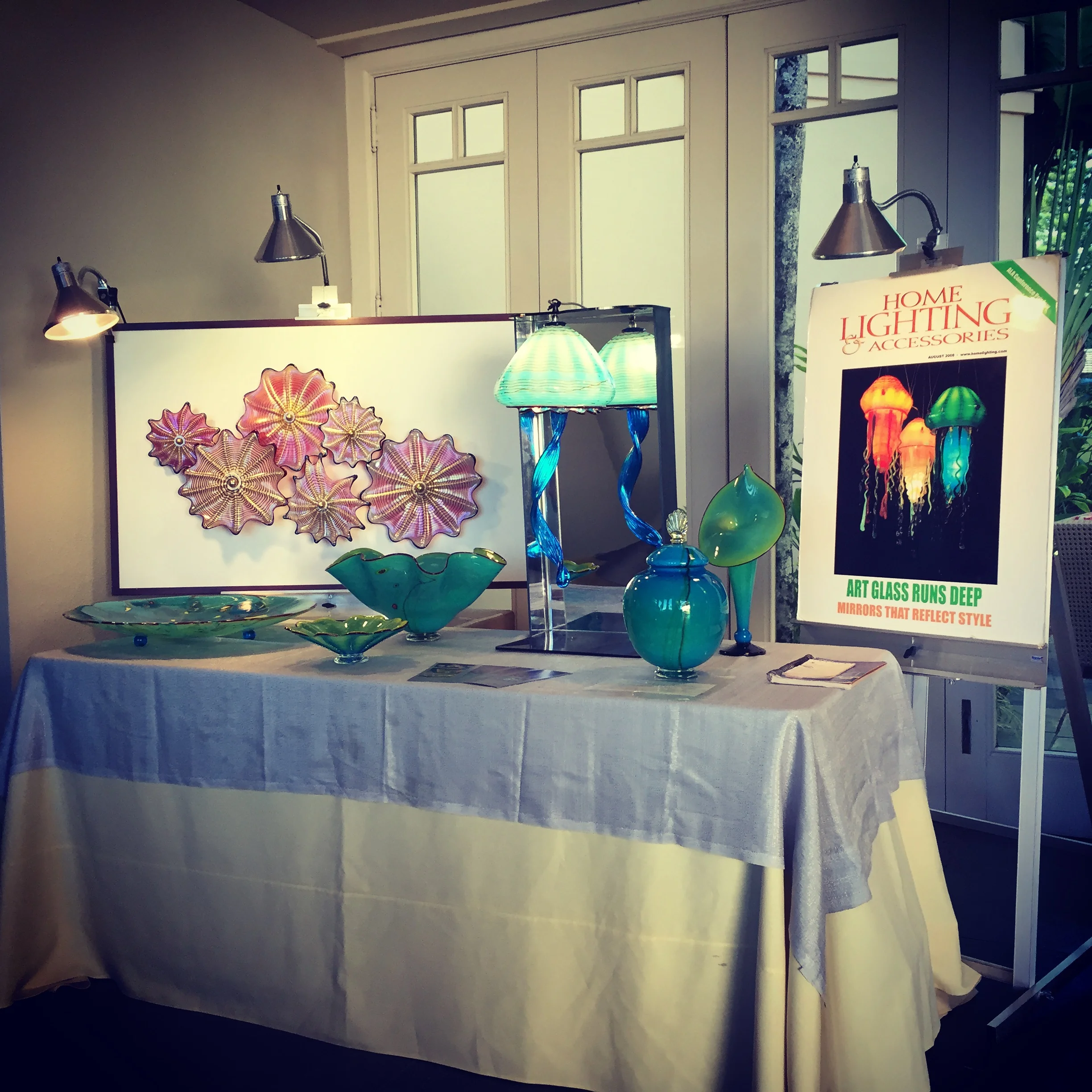 Another Day at the Ritz, Kapalua Maui Strini Art Glass new jellyfish, wall splash and platter in the Adventures in Paradise series, as well as the new Maui Wish Keeper. 2015