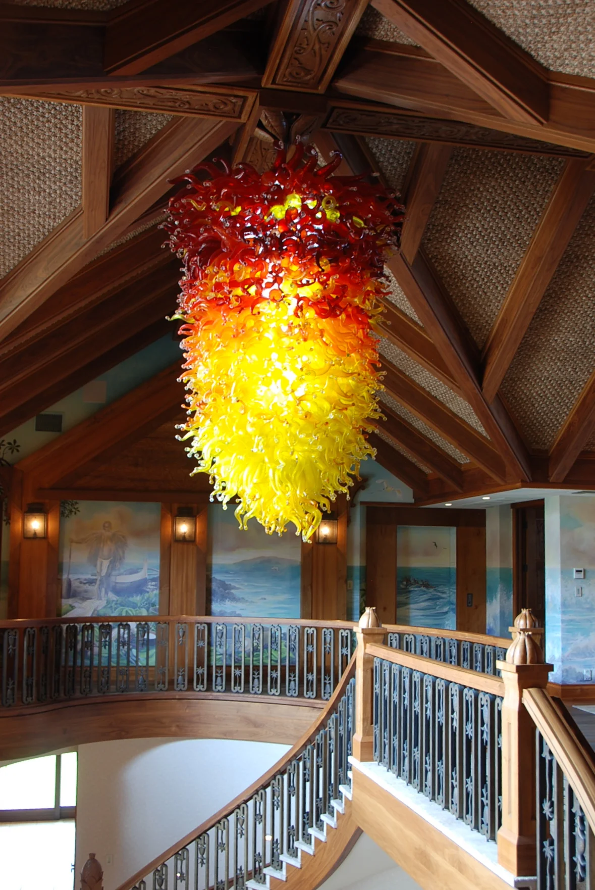 Pele Chandelier of over 1000 hand made pieces of glass and illuminated with LEDs. by artist Rick Strini withStrini Art Glass