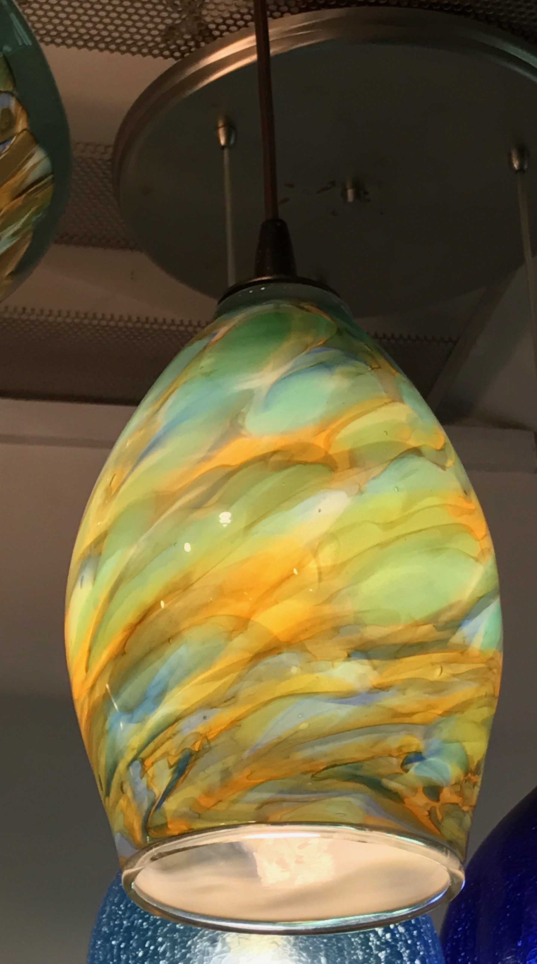There will be lots of pendants, as well as wall sconces, chandeliers, cups, glasses, and on. Feb. 18th and 19th11 - 6pm Artist 52 on the program. Strini Art Glass