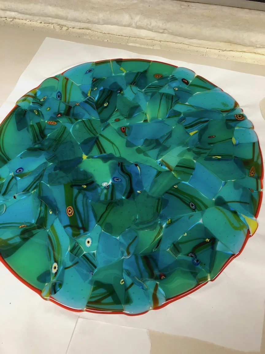 Now the dome is fused and will go to another firing cycle to shape it into a dome. strini art glass