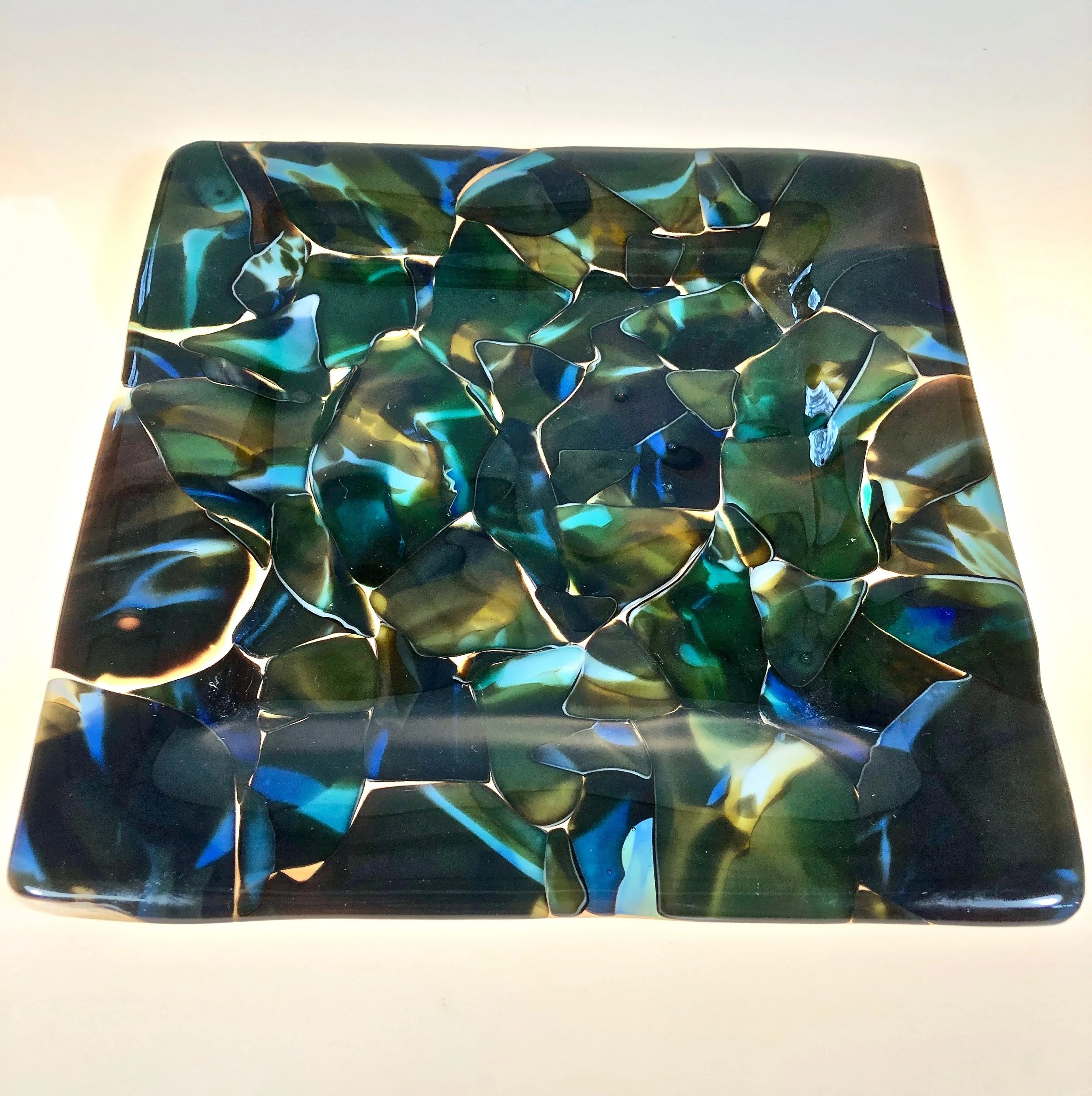 finished dinner ware with recycled bits of blown sfumato glass. rick strini