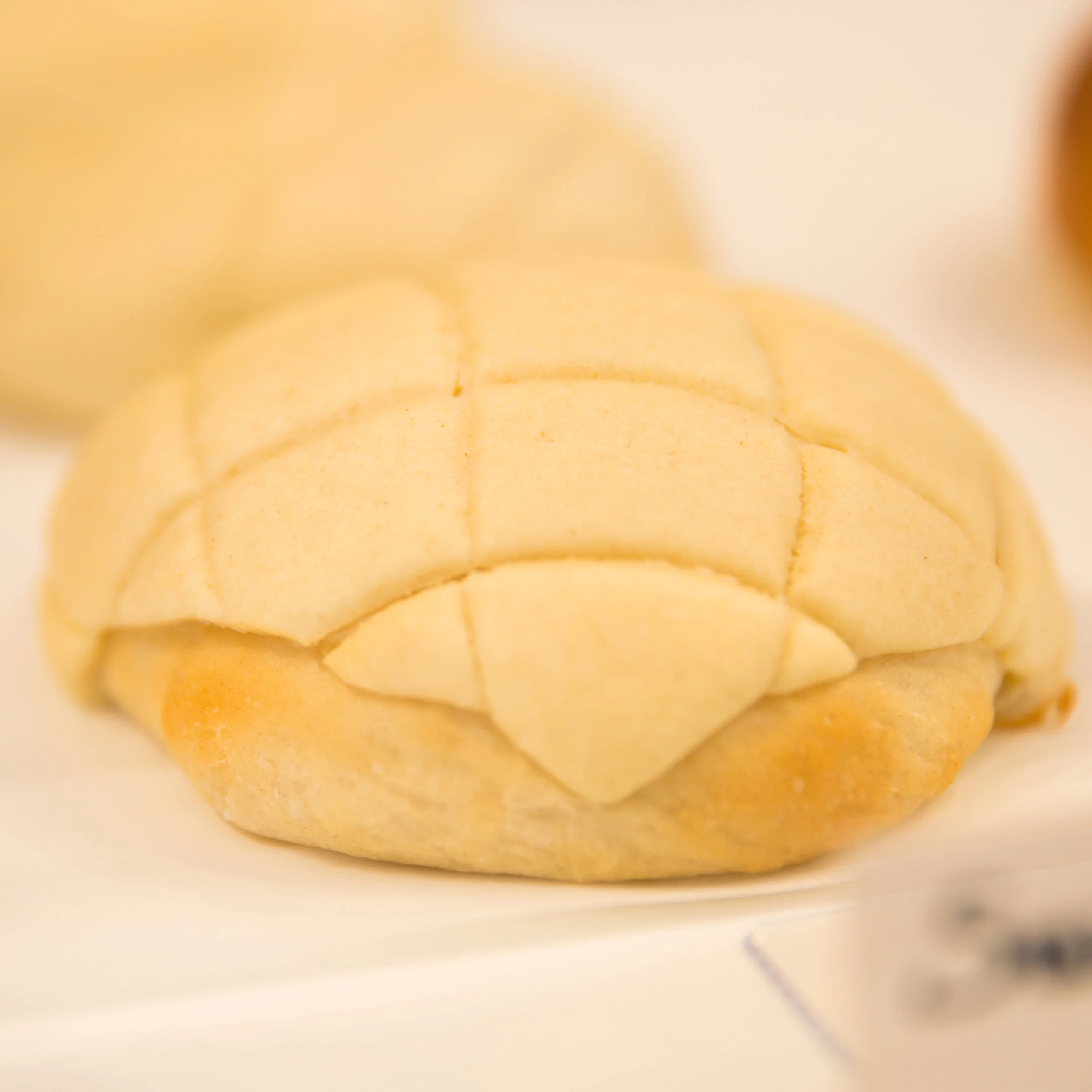 Sweet Crust Similar to Japan's "Melon Pan" and Hong Kong's "Pineapple Bao", we modified the recipe to create this sweet crust bun with a layer of condensed milk in between the bread and topping. The bun gives a beautiful sweet creamy taste, enhanced by its crunchy texture.