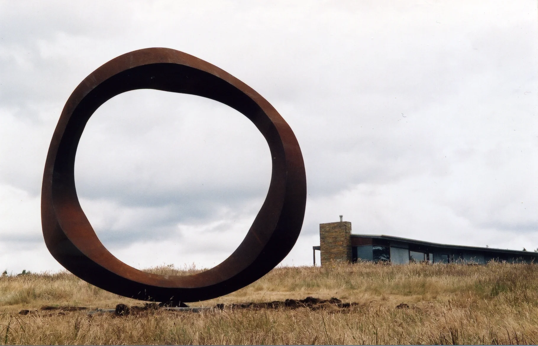 Greg Johns ,  Wavering Circle,  1984 Corten steel 3.5 metres high. Holmes a Court Collection. Western Australia