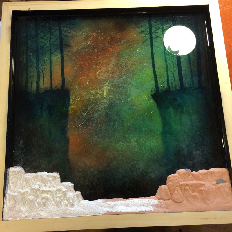I didn't start taking WIP shots until the background was done and the foreground elements were sculpted. The background is 3 layers of resin, with wet oil and acrylic paint mixed into it to created that swirling effect. Then I painted the cliffs and trees with oil paint. The foreground was made with Original Super Sculpey. 